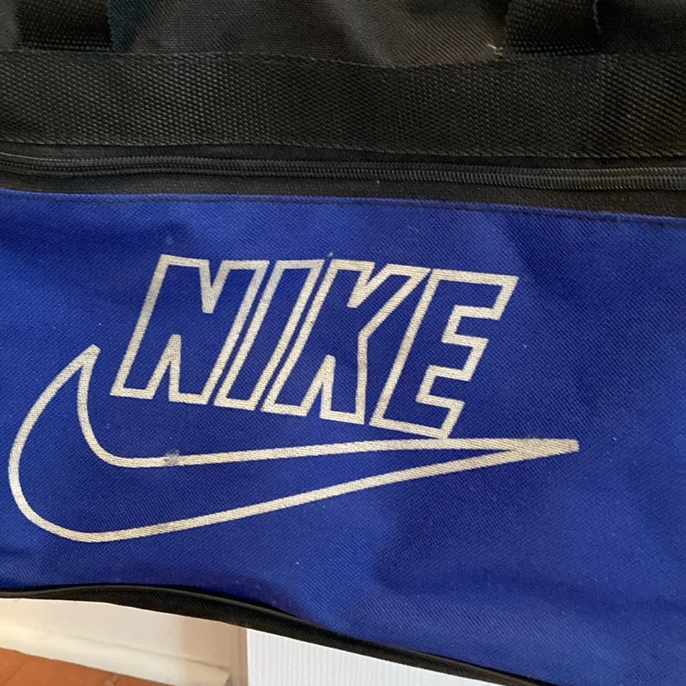 Nike gym bag: 17 inches x 8 inches x 9.5 inches.
